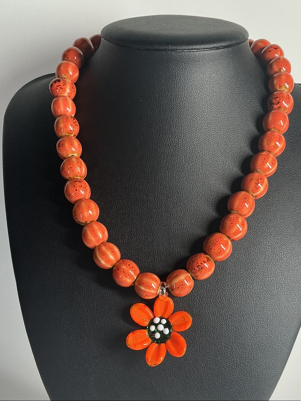 Vibrant Orange Beaded Necklace with Flower Pendant